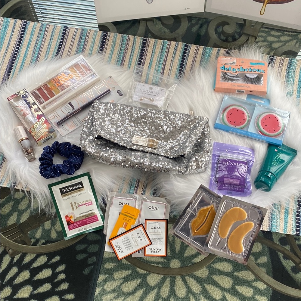 Nwot Victoria secrets Silver Sequin Clutch with Beauty Products